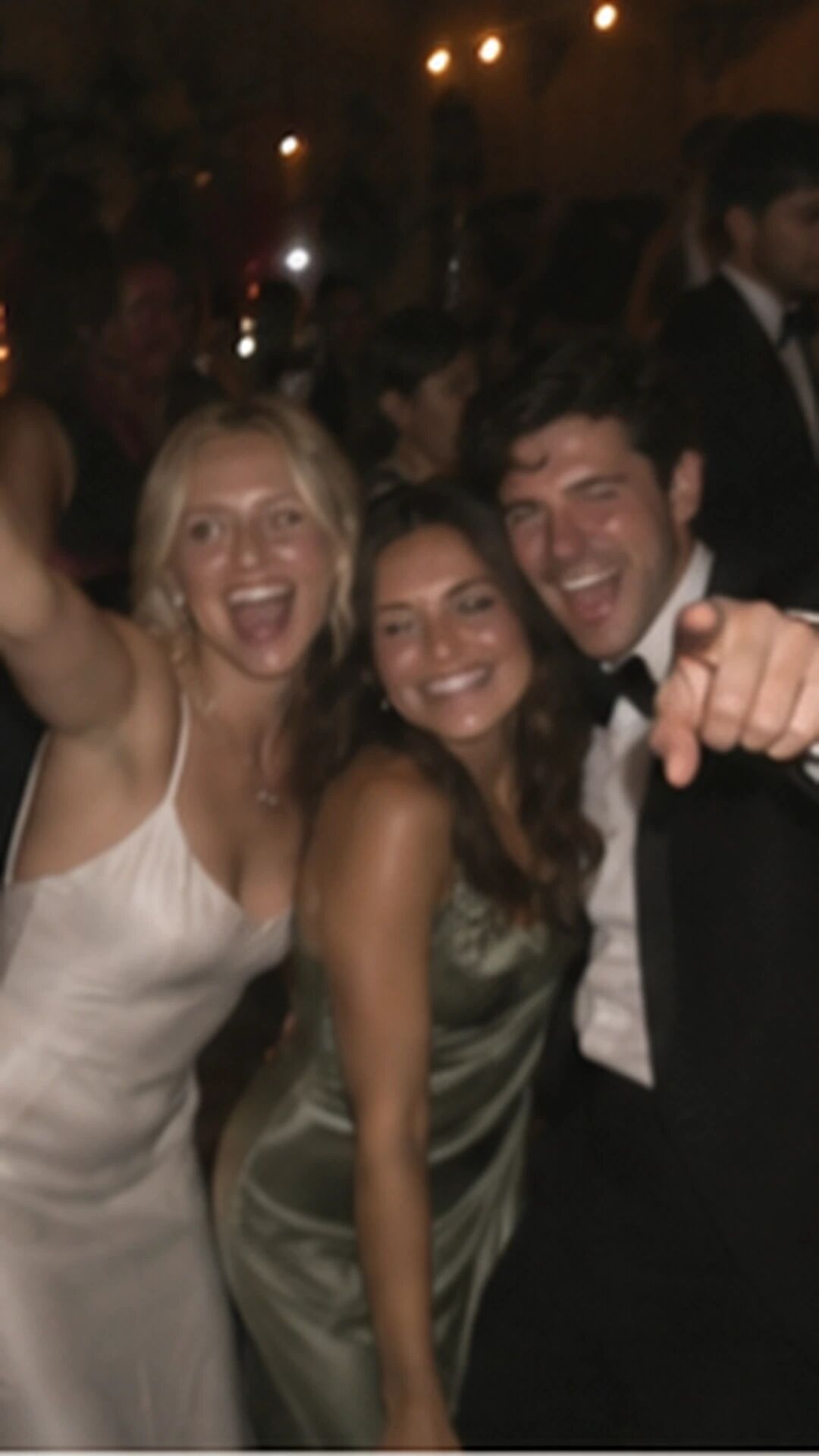 The live view inside the oop camera: three friends grinning