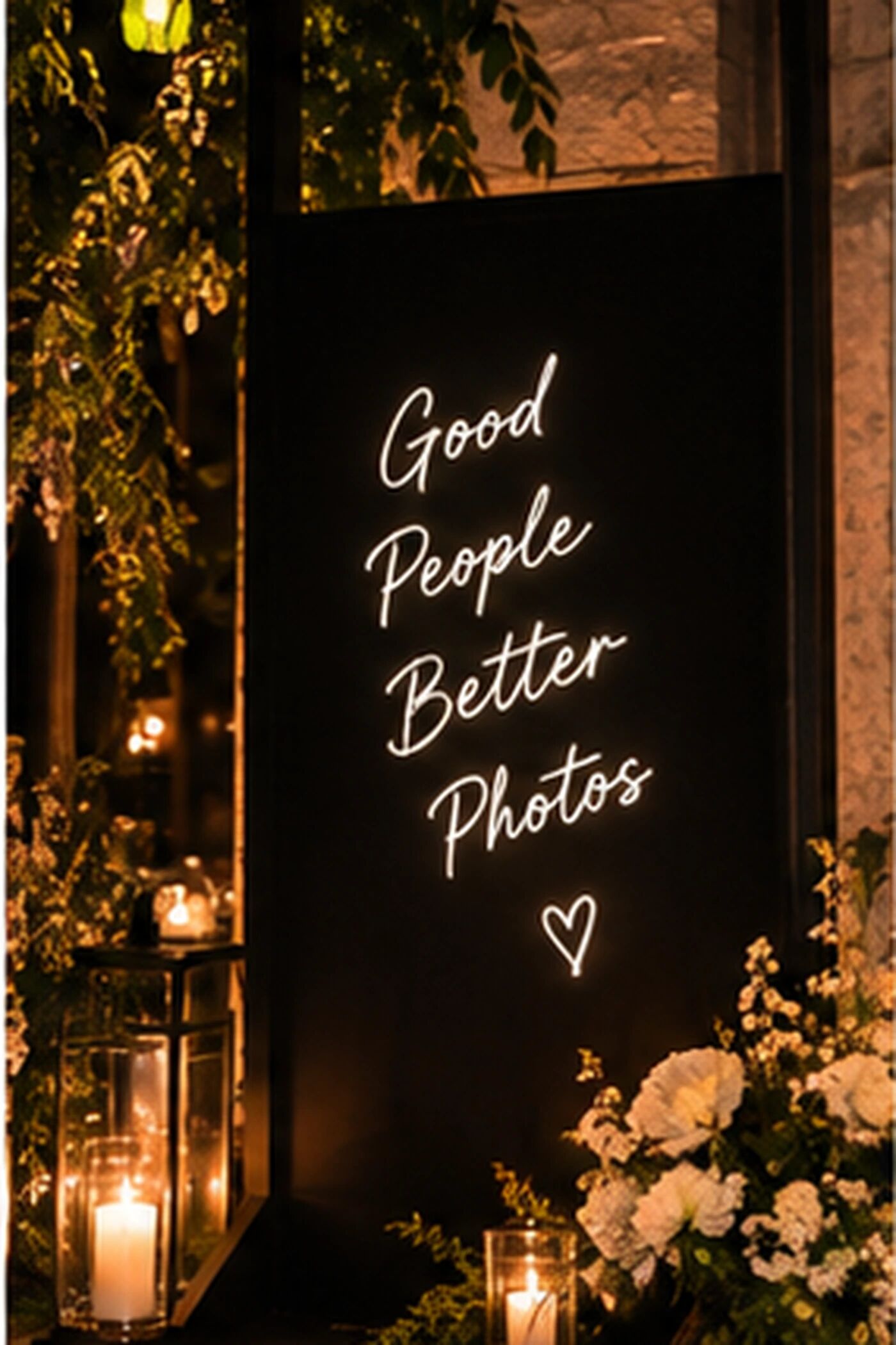 A neon welcome sign at the venue entrance