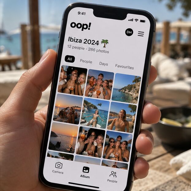 A hand holding a phone showing the oop album “Ibiza 2024”: 12 people, 286 photos