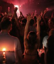 Arms up in a crowd at a club
