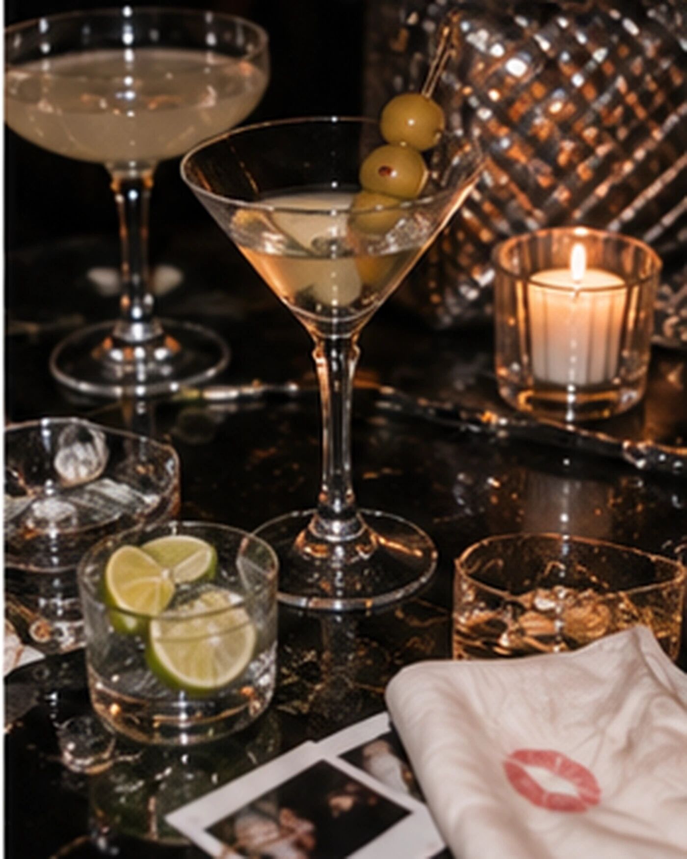 Cocktails, polaroids and a lipstick-marked napkin