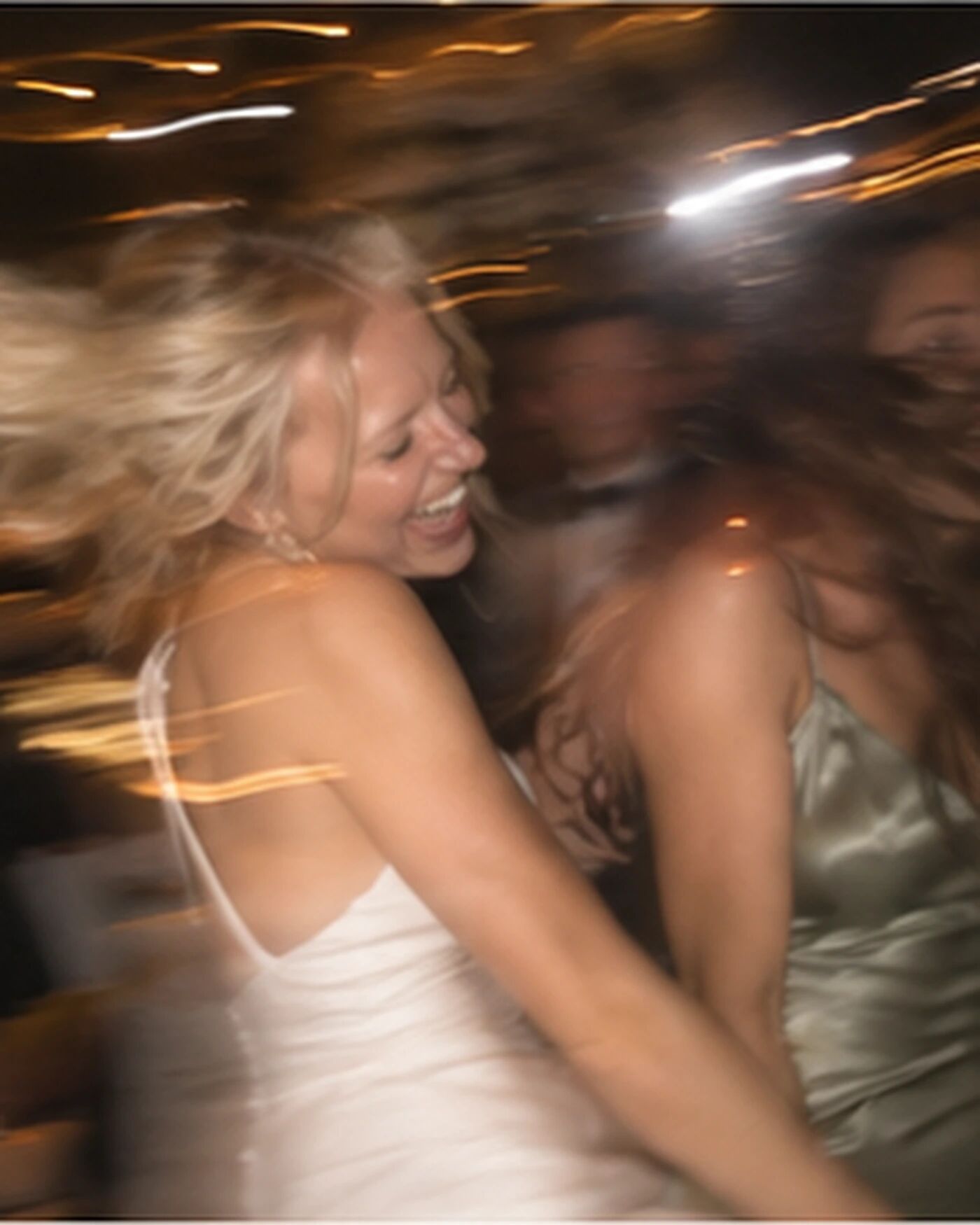 A blurred, motion-smeared dancer, kept exactly as taken